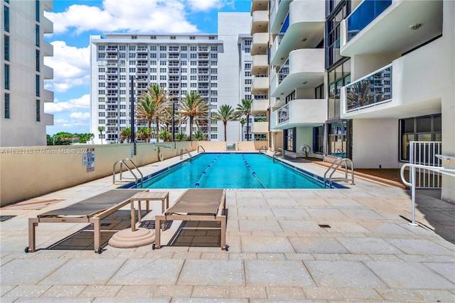 5757 Collins Ave Unit 801, Miami Beach, FL 33140 - community pool with a patio