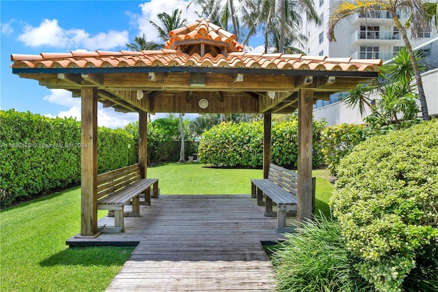 5757 Collins Ave Unit 801, Miami Beach, FL 33140 - wooden terrace with a gazebo and a yard