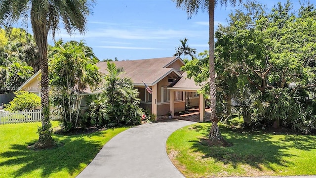 view of front of home with a front yard