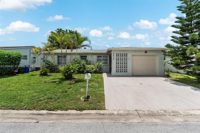 ranch-style home featuring cooling unit, a garage, and a front lawn