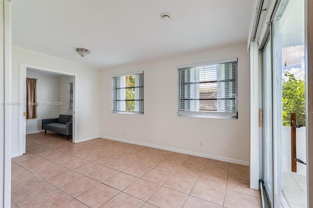 unfurnished bedroom featuring light tile patterned floors