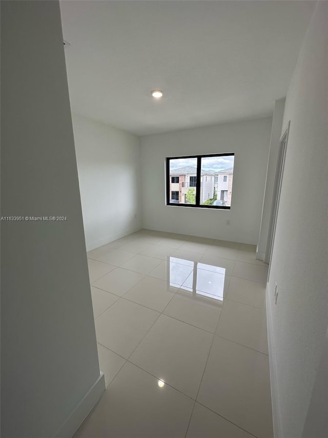 view of tiled spare room