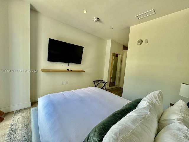 bedroom featuring hardwood / wood-style floors