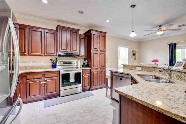 kitchen with range hood, pendant lighting, appliances with stainless steel finishes, and a wealth of natural light