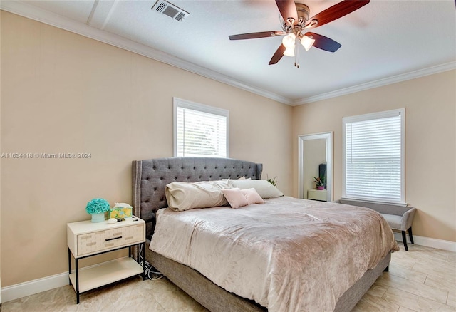 bedroom featuring crown molding and ceiling fan