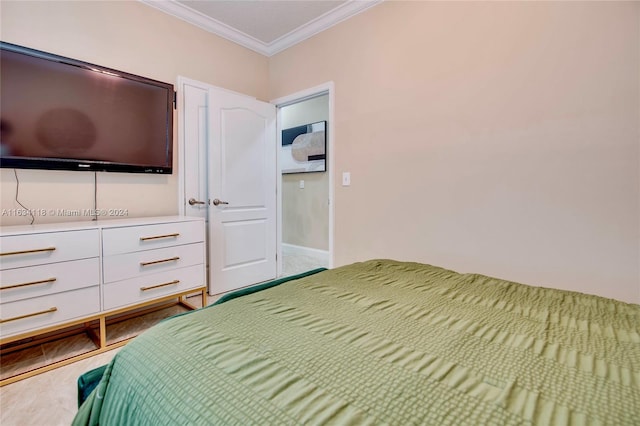 bedroom featuring wood-type flooring and crown molding