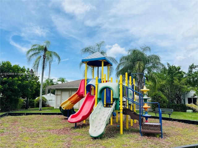 view of jungle gym featuring a yard