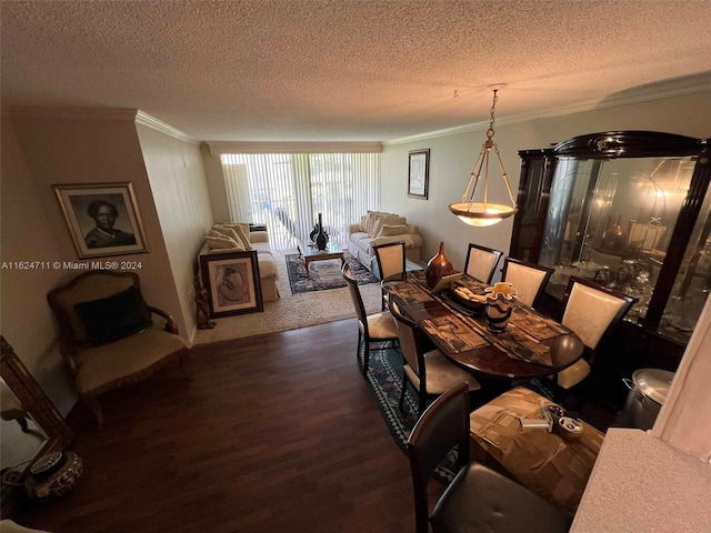 dining area featuring crown molding, a textured ceiling, and wood-type flooring