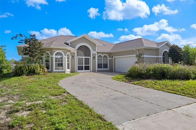 view of front of house with a garage