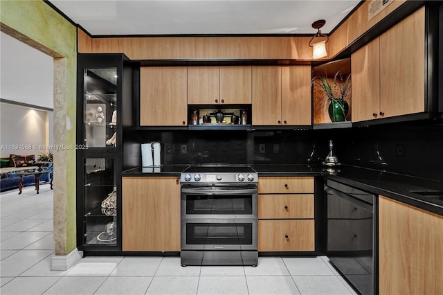 kitchen featuring light tile patterned floors, backsplash, black dishwasher, and range with two ovens