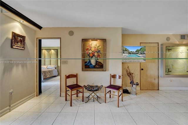 living area with light tile patterned flooring