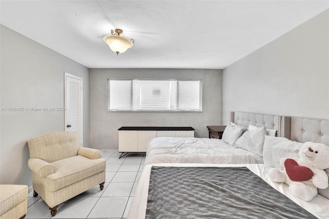 tiled bedroom with radiator