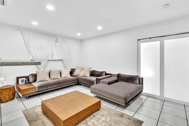 living room with light tile patterned floors