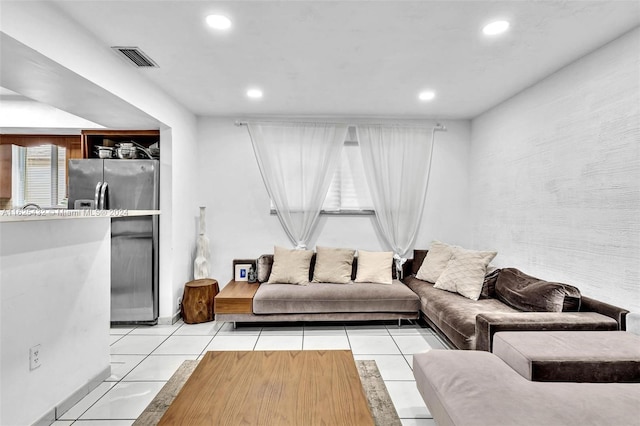 living room featuring light tile patterned flooring