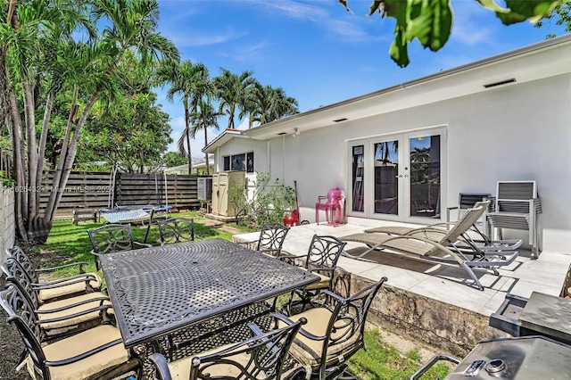 view of patio featuring french doors