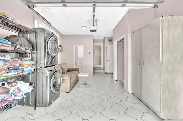 washroom with stacked washer and dryer