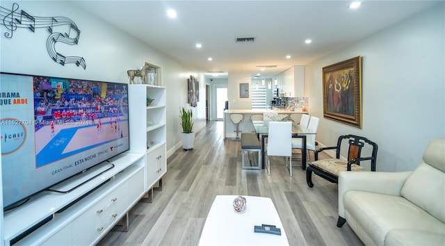 living room featuring light hardwood / wood-style flooring