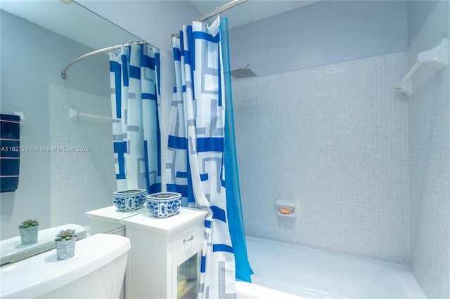 bathroom with toilet and shower / bath combination with curtain