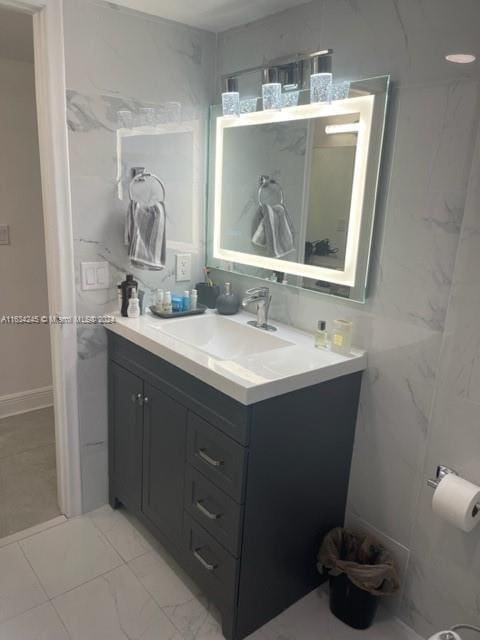 2401 S Ocean Dr Unit 1203, Hollywood, FL 33019 - bathroom with vanity and tile walls