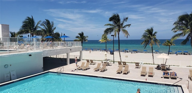 2401 S Ocean Dr Unit 1203, Hollywood, FL 33019 - view of swimming pool with a water view and a beach view