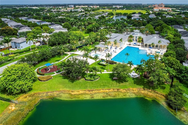 birds eye view of property with a water view