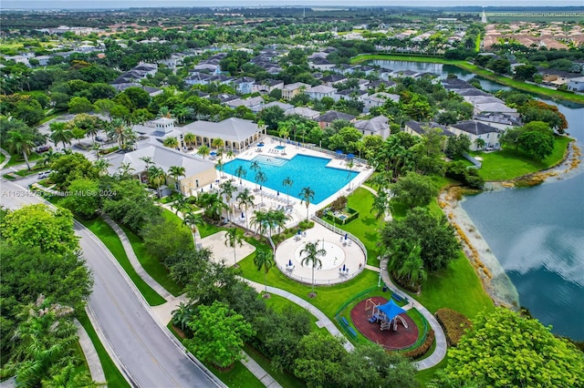 birds eye view of property with a water view