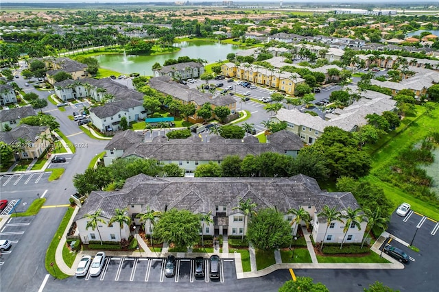 drone / aerial view with a water view