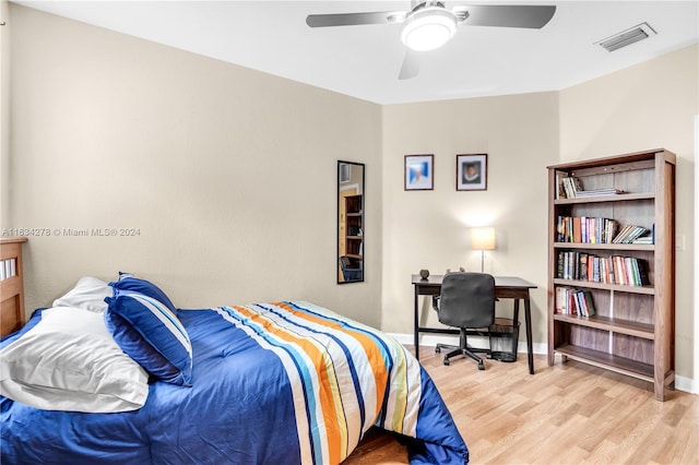 bedroom featuring ceiling fan and light hardwood / wood-style flooring