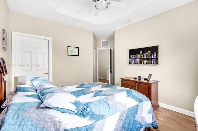 bedroom featuring ceiling fan and light wood-type flooring