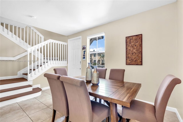 dining room featuring light tile patterned flooring