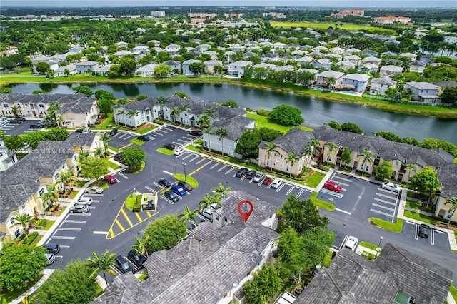 drone / aerial view with a water view