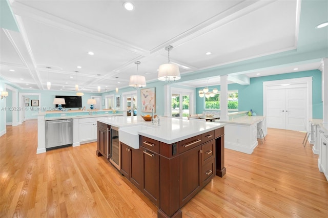 kitchen featuring recessed lighting, light wood-type flooring, open floor plan, and a large island