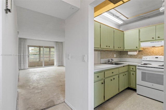 kitchen with decorative backsplash, green cabinetry, sink, and electric stove