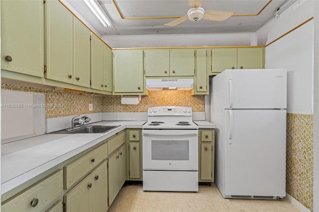 kitchen with tasteful backsplash, white appliances, sink, and ceiling fan