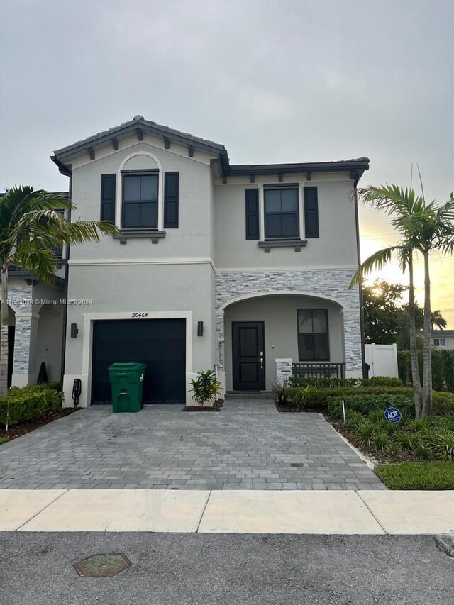 view of front of house with a garage