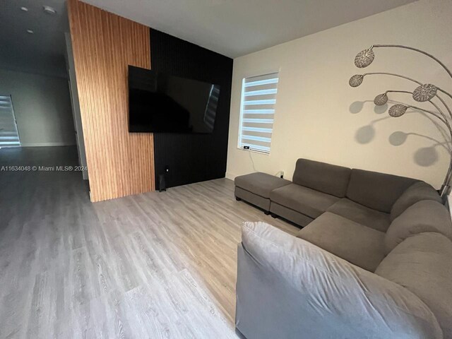 living room with wood-type flooring