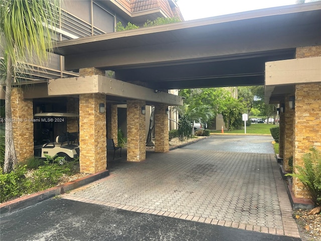 view of parking with a carport