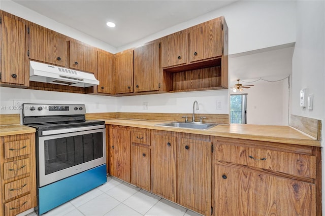 kitchen featuring sink, ceiling fan, light tile patterned floors, and stainless steel electric stove