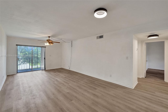 unfurnished room featuring wood-type flooring and ceiling fan