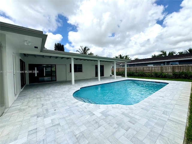 view of pool featuring a patio area