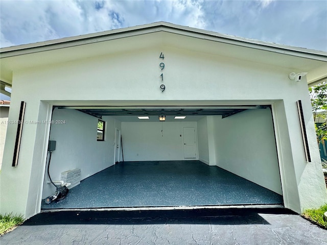 garage with a carport