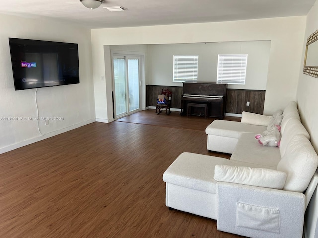 living room featuring dark hardwood / wood-style flooring