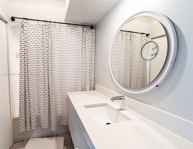 bathroom with vanity and shower / bathtub combination with curtain