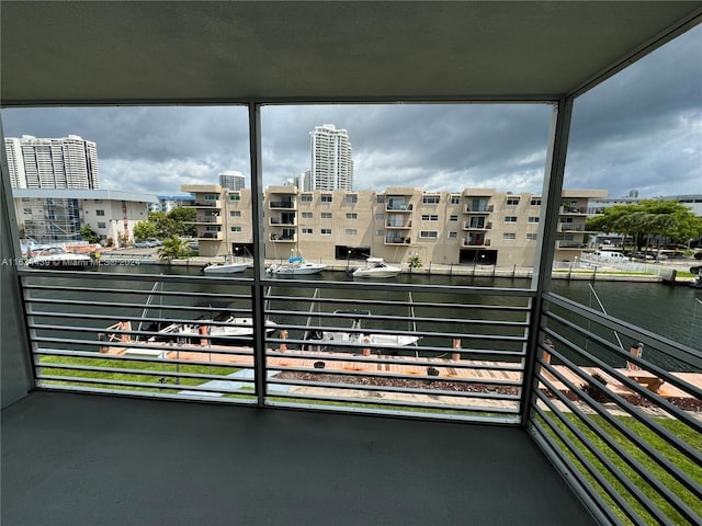 balcony featuring a water view