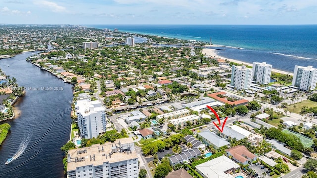 bird's eye view with a water view