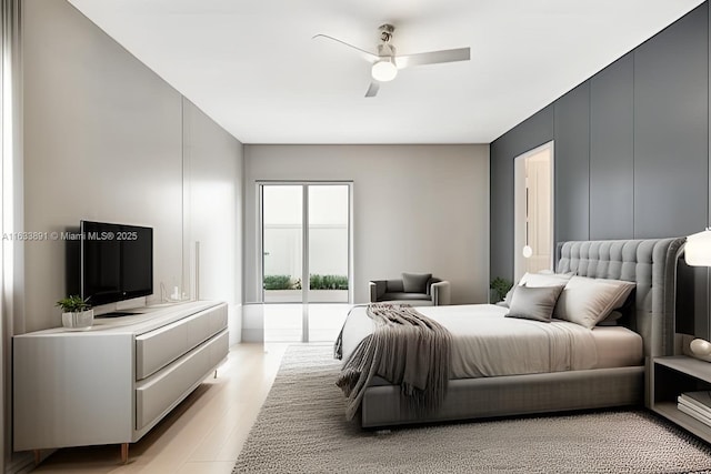 bedroom with ceiling fan and light wood-style flooring