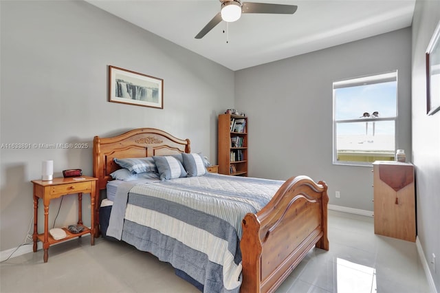 bedroom with light tile patterned floors and ceiling fan