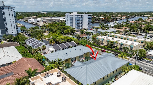 birds eye view of property featuring a water view