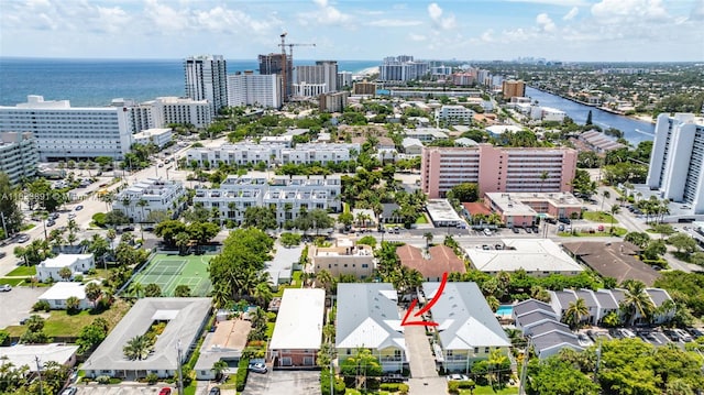 drone / aerial view with a water view