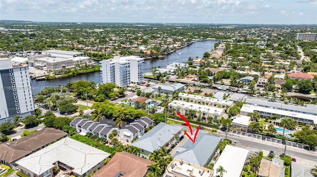 bird's eye view with a water view and a residential view